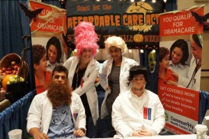 CHC staff & AmeriCorps sitting at the Expo booth in full costume!