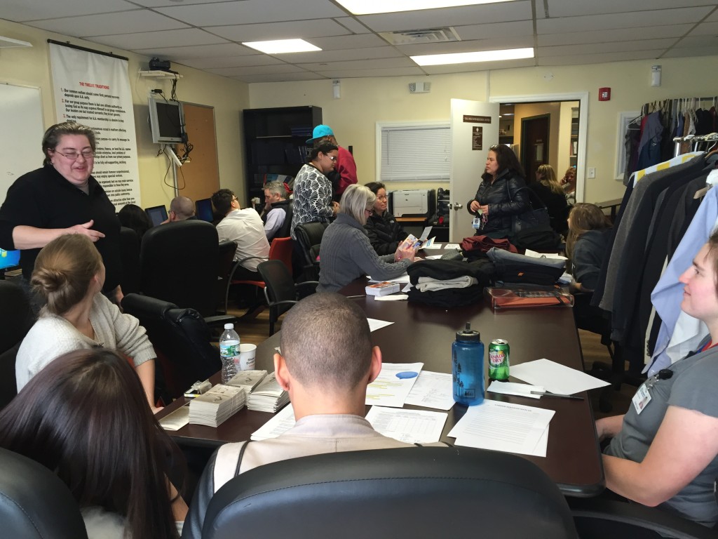 HealthCorps members served attendees of a career fair at the Open Door Shelter.